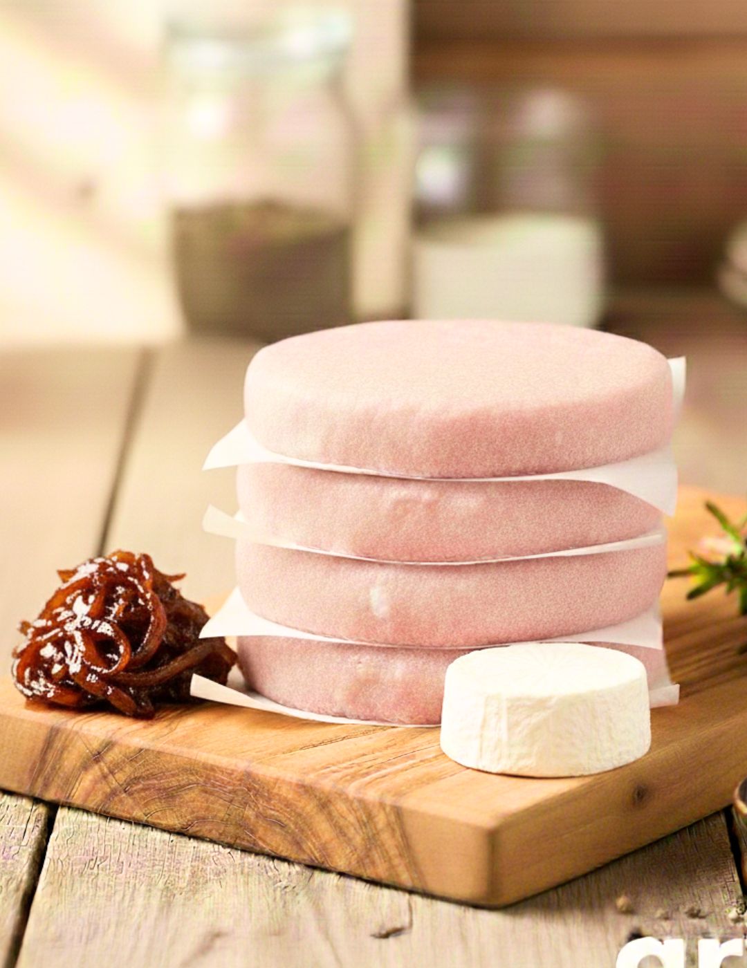 HAMBURGUESA RULO DE CABRA CON CEBOLLA CARAMELIZADA